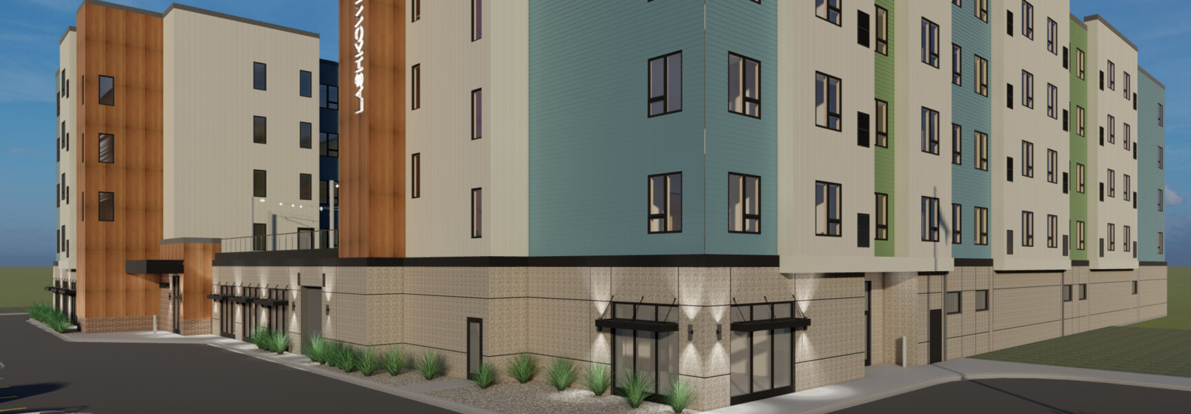 Modern multi-story building with a mix of wood, beige, and green panels.