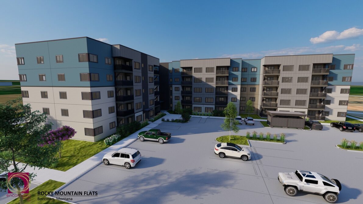 Rocky Mountain Flats apartment complex rendering, Bozeman, Montana, with cars in parking lot and surrounding landscaping