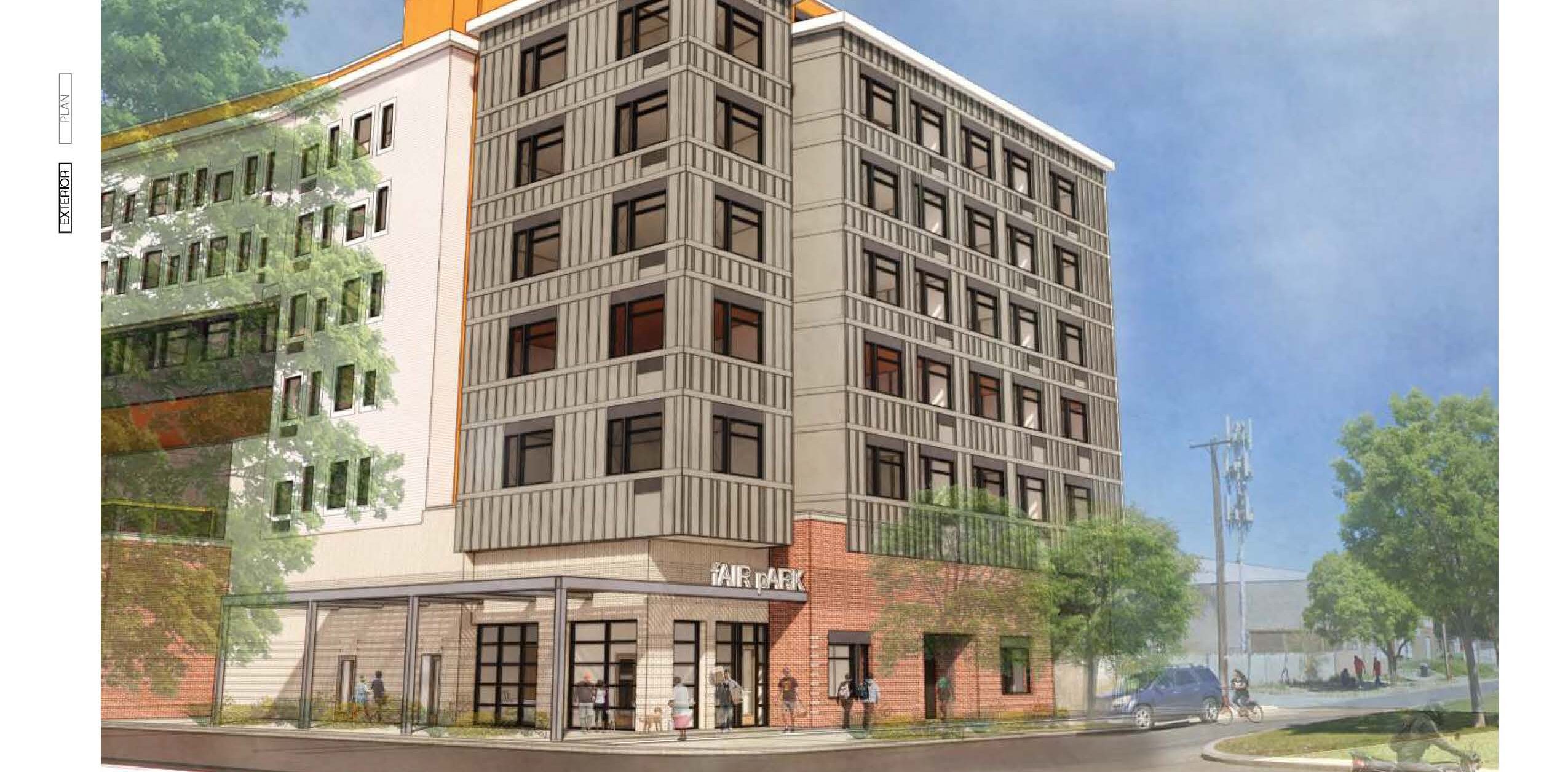 South East perspective of a multi-story building with "Fair Park" signage, surrounded by trees.